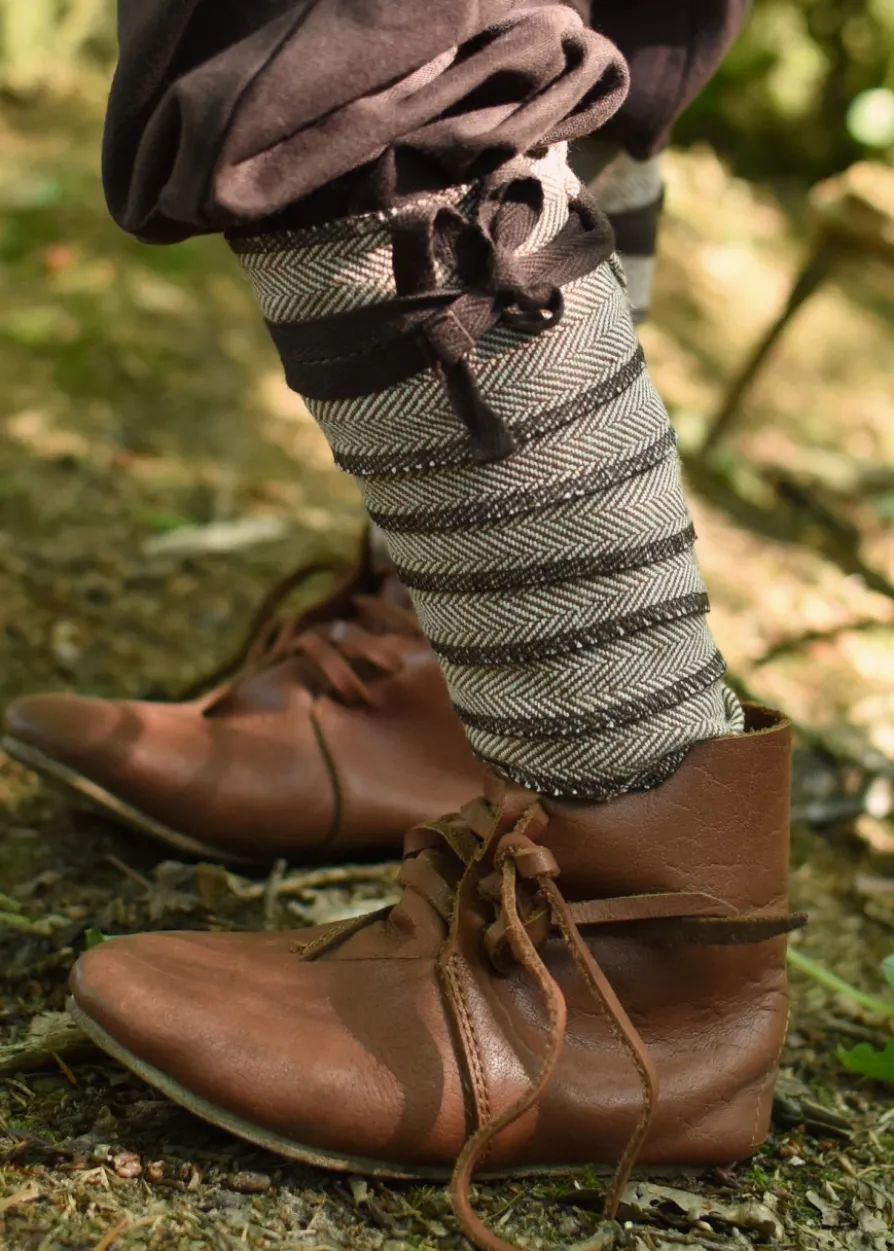 Mittelalterliche Kinderschuhe mit Schnürverschluss